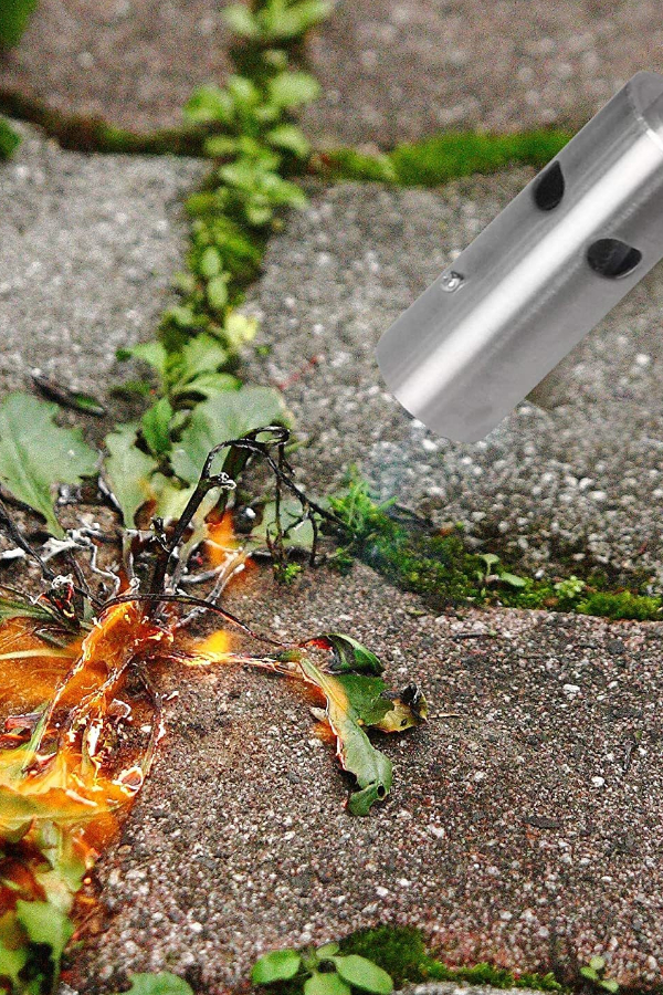using a weed torch to control weeds